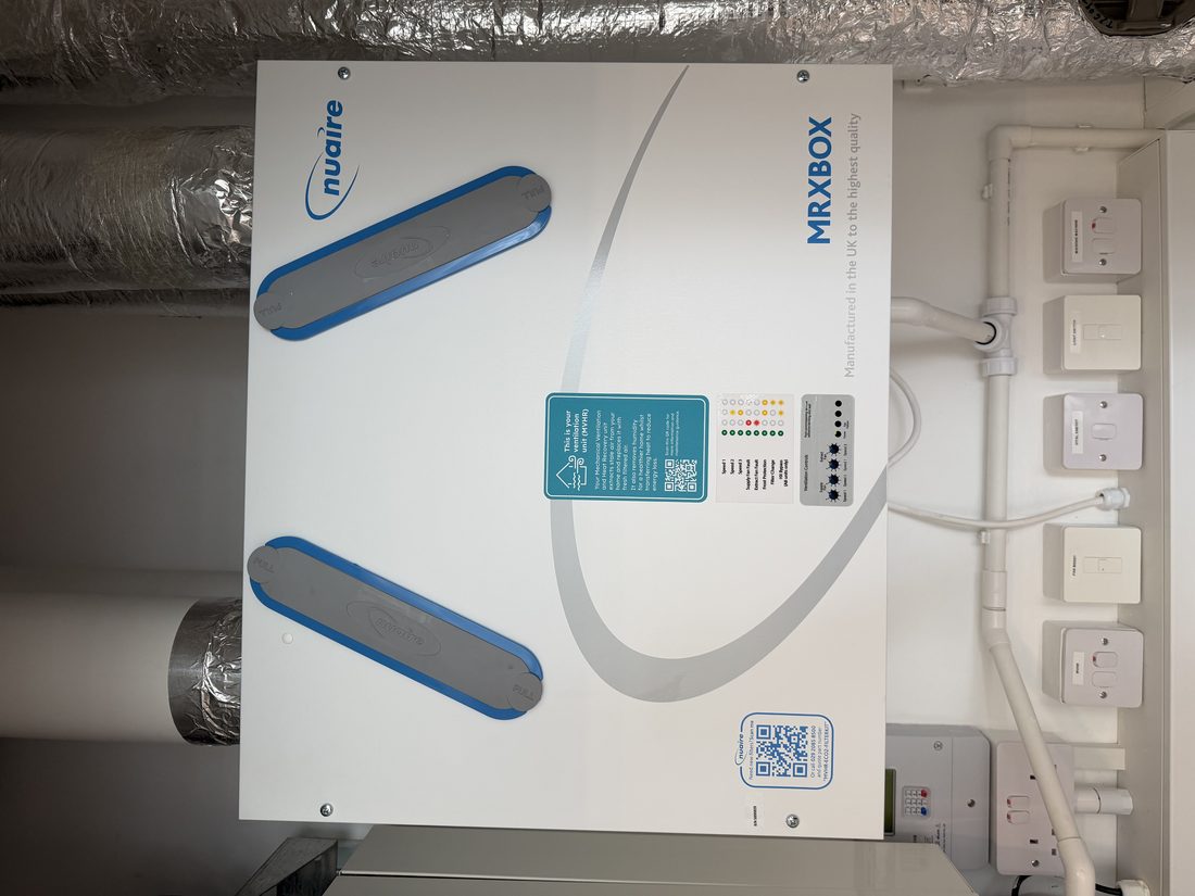 Nuaire mechanical ventilation with heat recovery unit, documented in the building-systems log