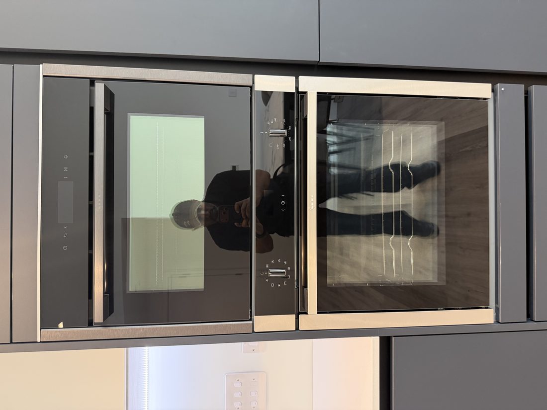 Integrated Neff oven photographed and specified by make and model in the advert
