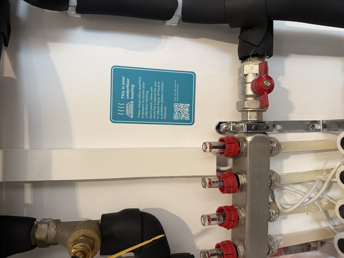 Underfloor-heating manifold photographed and logged in the advert