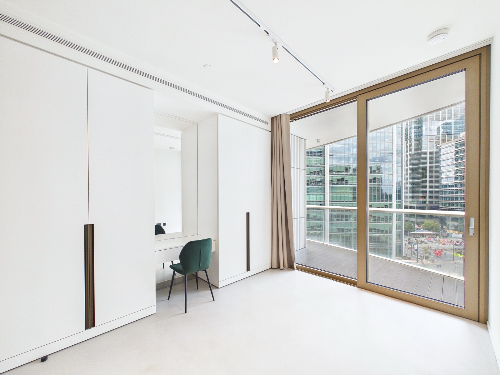 Second bedroom with fitted wardrobes — One Park Drive, Wood Wharf