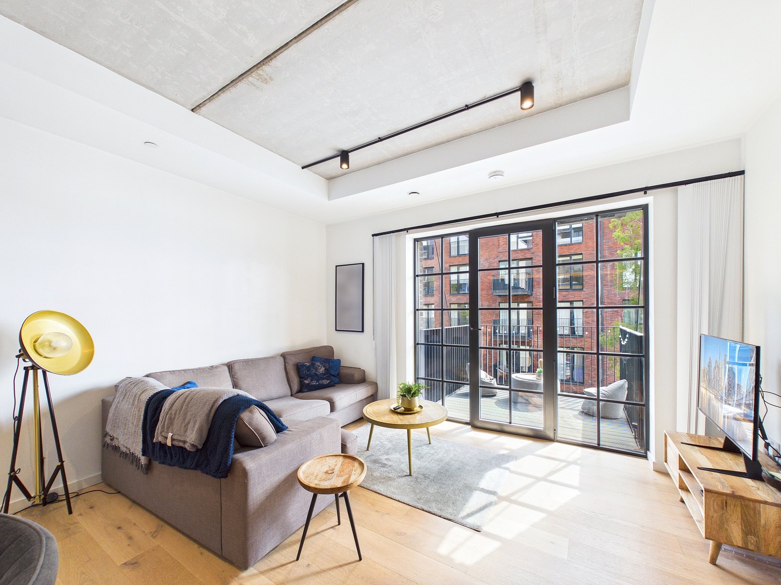 Open-plan living to the balcony doors — Agar House, Goodluck Hope